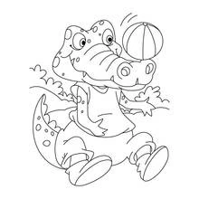 Crocodile playing with a beach ball coloring page