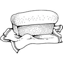 Loaf of bread on a cloth coloring page