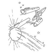 USS Enterprise firing on an asteroid coloring page