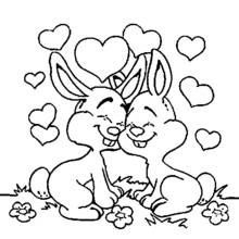 Bunnies in love surrounded by hearts coloring page